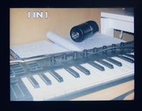 a keyboard on top of a desk